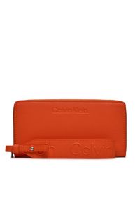 Calvin Klein Duży Portfel Damski Gracie Wallet W/Strap Lg K60K611388 Pomarańczowy. Kolor: pomarańczowy. Materiał: skóra #1