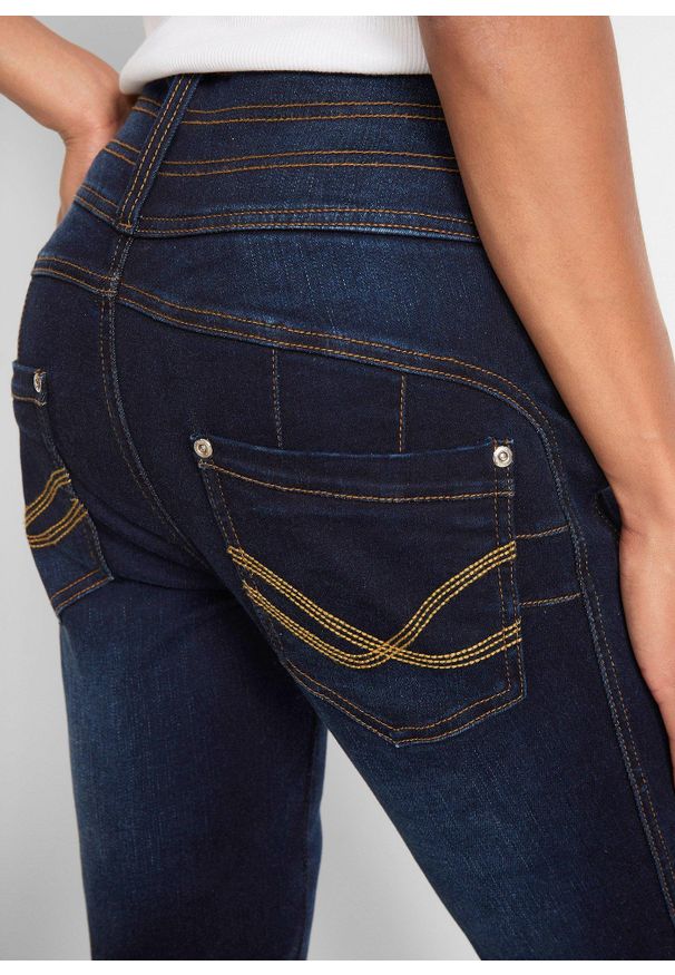 bonprix - Modelujące dżinsy, krój bootcut. Kolor: niebieski