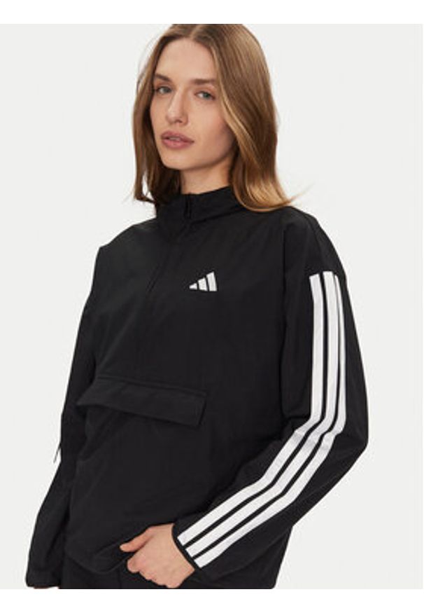 Adidas - adidas Wiatrówka Essentials 3-Stripes JE1312 Czarny Regular Fit. Kolor: czarny. Materiał: syntetyk