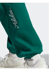 Adidas - adidas Spodnie dresowe Scribble Fleece IJ6457 Zielony Loose Fit. Kolor: zielony. Materiał: bawełna, dresówka #3