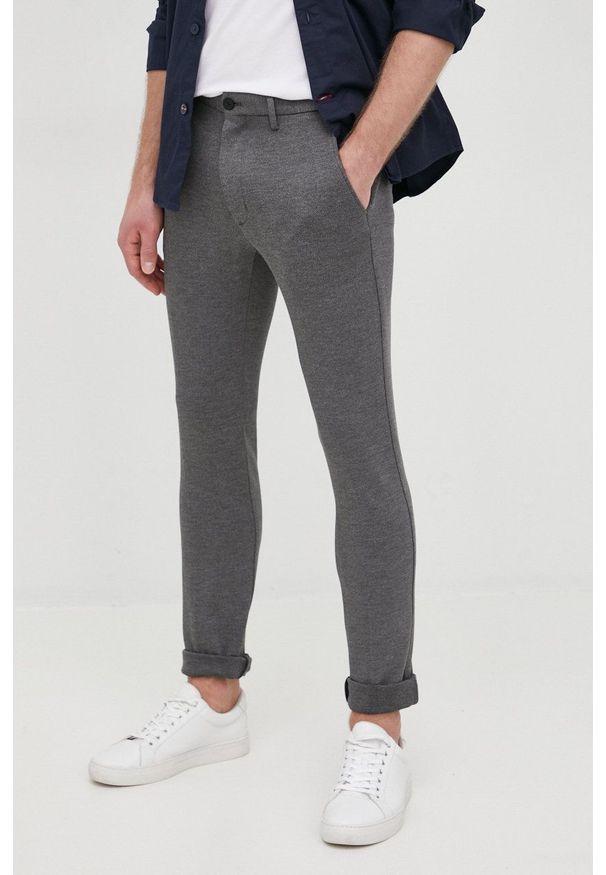 TOMMY HILFIGER - Tommy Hilfiger spodnie BLEECKER męskie kolor szary w fasonie chinos. Kolor: szary. Materiał: dzianina