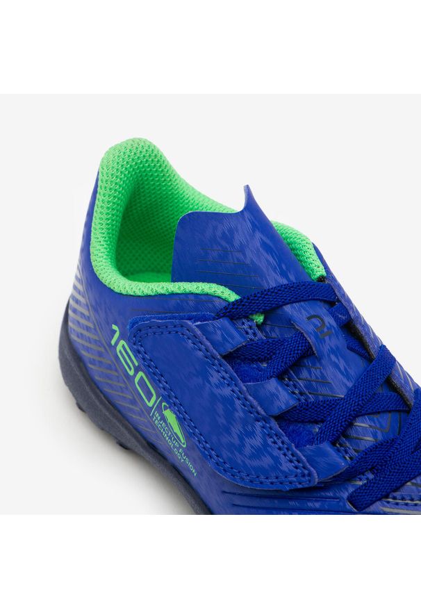 KIPSTA - Buty piłkarskie dla dzieci Kipsta 160 Turf na rzepy. Zapięcie: rzepy. Kolor: niebieski. Materiał: poliester. Szerokość cholewki: normalna. Sport: piłka nożna