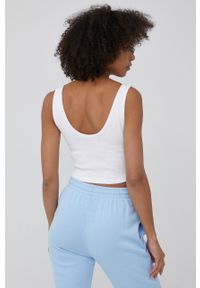 Calvin Klein Jeans top damski kolor biały. Kolor: biały. Materiał: lycra, materiał. Długość rękawa: na ramiączkach. Wzór: aplikacja
