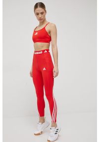 adidas Performance legginsy treningowe 3-Stripes damskie kolor czerwony z nadrukiem. Kolor: czerwony. Materiał: materiał, poliester, skóra, dzianina. Wzór: nadruk. Sport: fitness