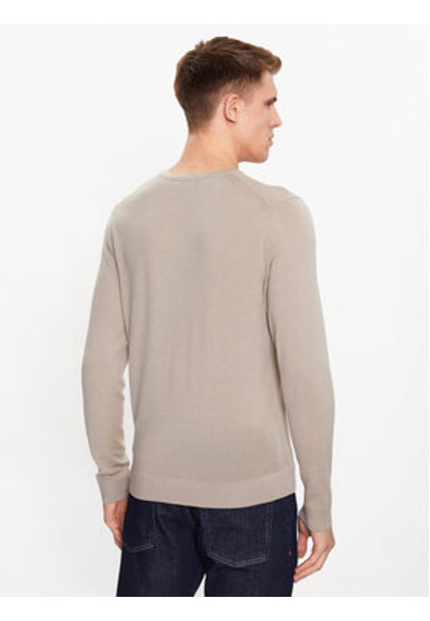 Calvin Klein Sweter K10K109474 Beżowy Regular Fit. Kolor: beżowy. Materiał: wełna