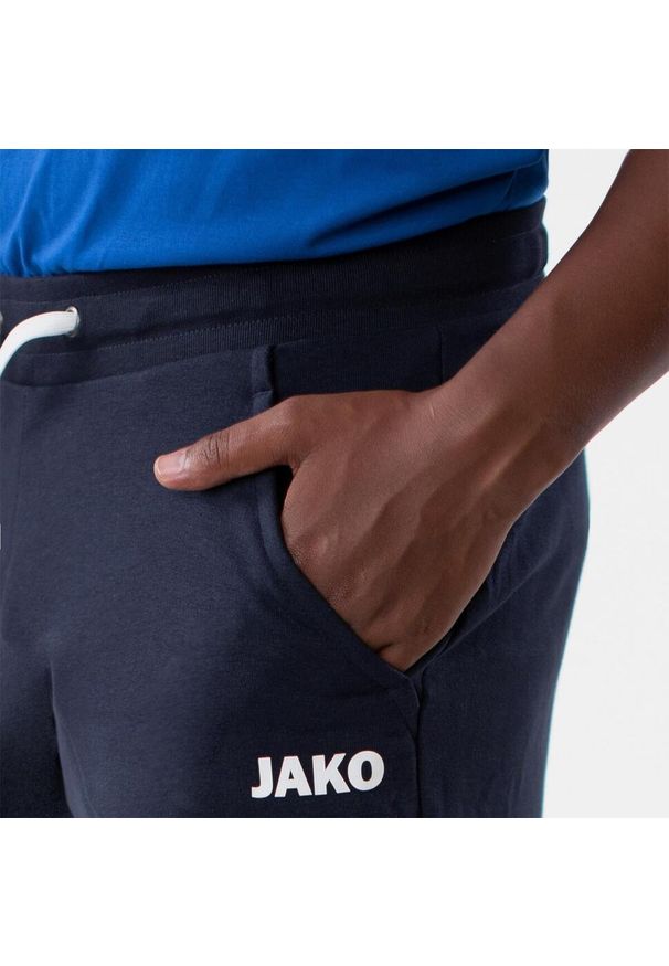 Spodnie dresowe Jako jogging Base avec bord. Kolor: niebieski. Materiał: dresówka. Sport: bieganie