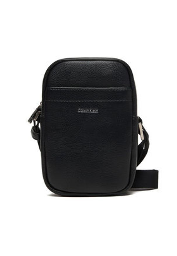 Calvin Klein Saszetka Raised Slim Reporter LV04D3278G Czarny. Kolor: czarny. Materiał: skóra