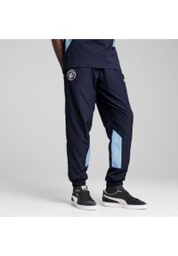 Puma - Spodnie dresowe Manchester City 2024/25. Kolor: niebieski. Materiał: dresówka. Sport: piłka nożna