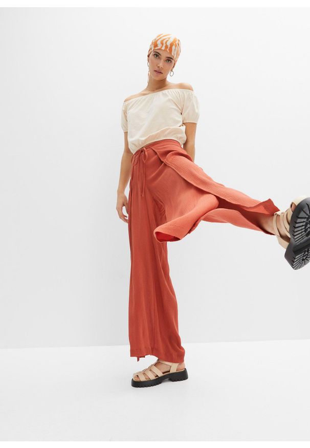 bonprix - Spodnie z lejącej wiskozy. Kolor: brązowy. Materiał: wiskoza