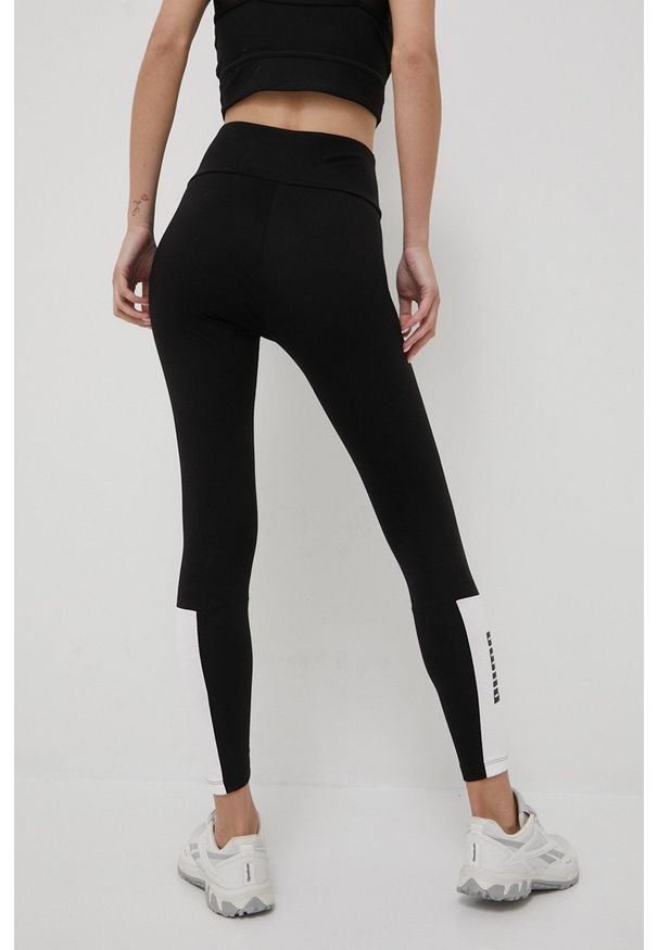 Puma legginsy Power Colorblock damskie kolor czarny z nadrukiem. Kolor: czarny. Materiał: skóra, dzianina, bawełna. Wzór: nadruk