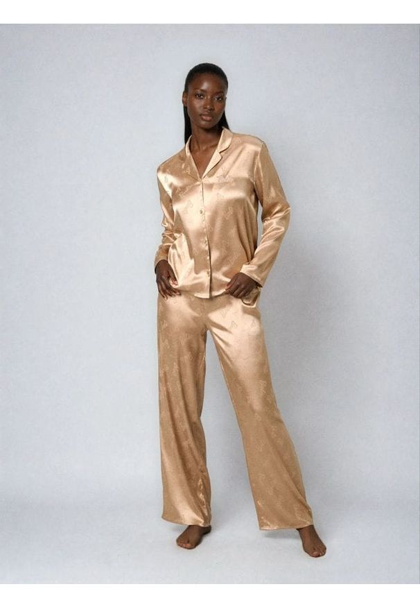 Sinsay - Piżama dwuczęściowa ze wzorem Barbie - kremowy. Kolor: kremowy