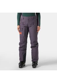 Spodnie narciarskie dla kobiet Helly Hansen Powderqueen. Kolor: fioletowy. Materiał: puch. Sezon: zima. Sport: narciarstwo #1