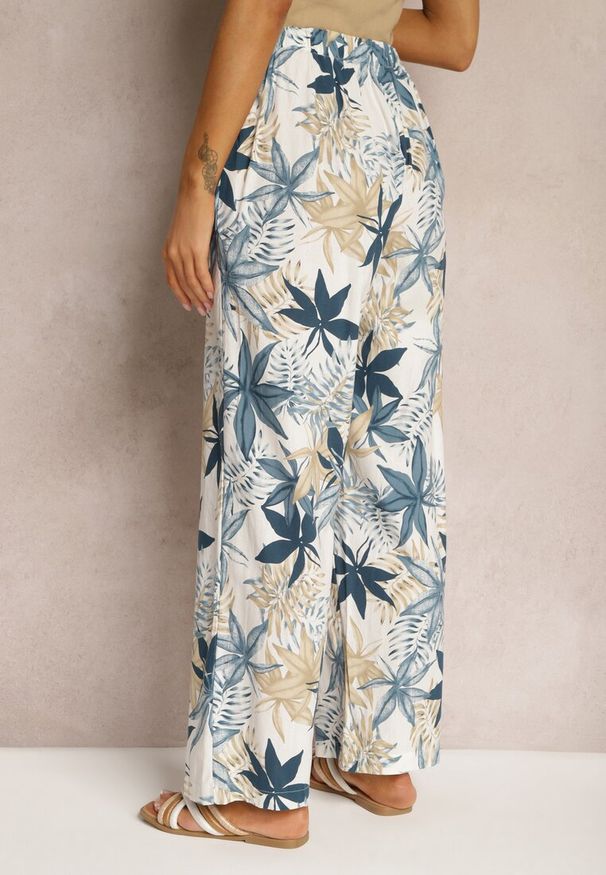 Renee - Niebieskie Bawełniane Spodnie z Szerokimi Nogawkami i Gumką w Pasie Hazis. Stan: podwyższony. Kolor: niebieski. Materiał: bawełna. Długość: długie