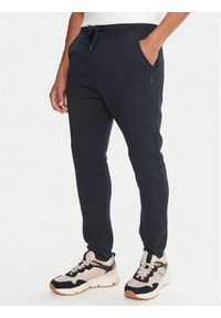 G-Star RAW - G-Star Raw Spodnie dresowe Premium Core D15653-C235 Granatowy Slim Fit. Kolor: niebieski. Materiał: bawełna