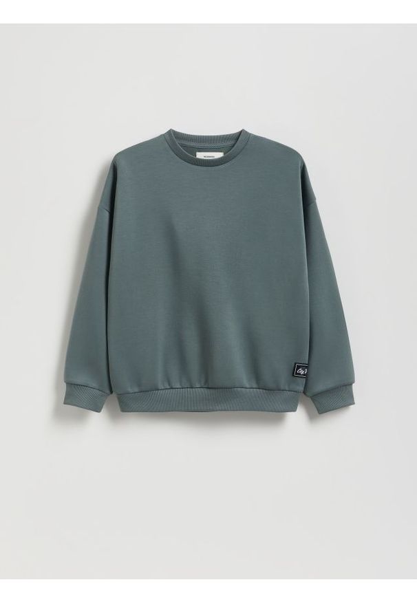 Reserved - Bluza oversize z nadrukiem - zielony. Kolor: zielony. Materiał: dzianina. Wzór: nadruk