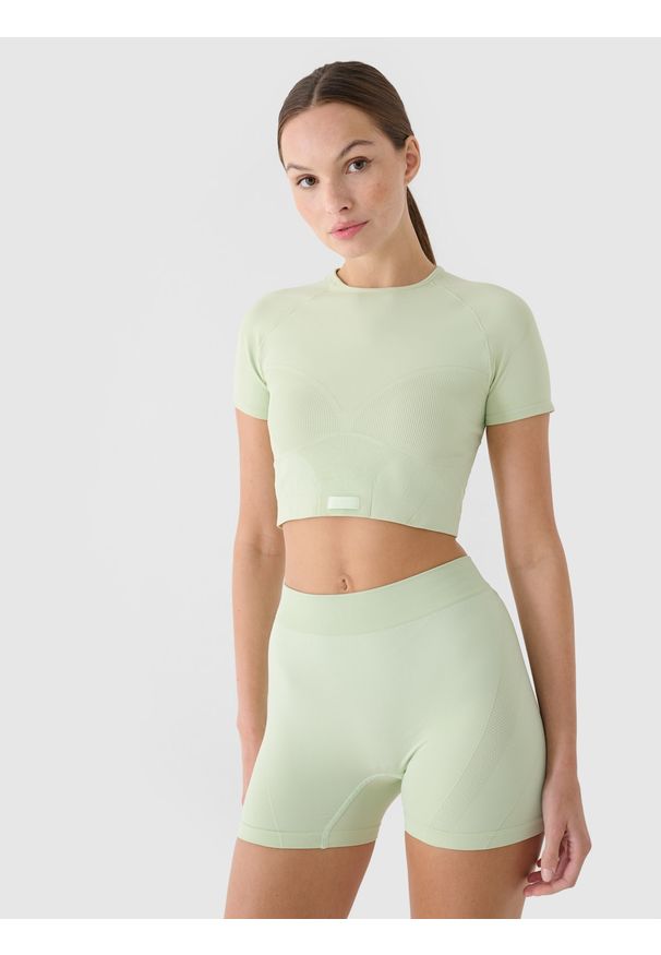 4f - 4F Crop top treningowy slim szybkoschnący damski - turkusowy XS/S. Kolor: turkusowy. Materiał: włókno, dzianina, materiał, syntetyk. Długość rękawa: raglanowy rękaw. Wzór: gładki, ze splotem. Sport: fitness