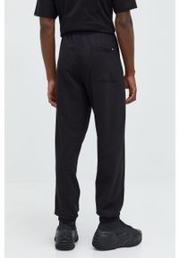 Vans spodnie dresowe bawełniane męskie kolor czarny z aplikacją. Kolor: czarny. Materiał: bawełna, dresówka. Wzór: aplikacja #4
