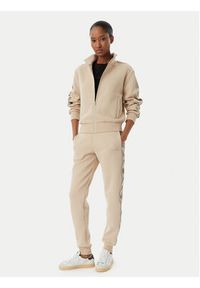 Guess Spodnie dresowe V2YB15 KB3P2 Beżowy Regular Fit. Kolor: beżowy. Materiał: bawełna #3