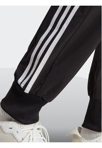 Adidas - adidas Spodnie dresowe AEROREADY Essentials Tapered Cuff Woven 3-Stripes Joggers IC0041 Czarny Regular Fit. Kolor: czarny. Materiał: syntetyk #7
