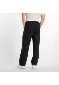 Spodnie męskie New Balance MP51563BK – czarne. Kolor: czarny. Materiał: bawełna, materiał, nylon #5