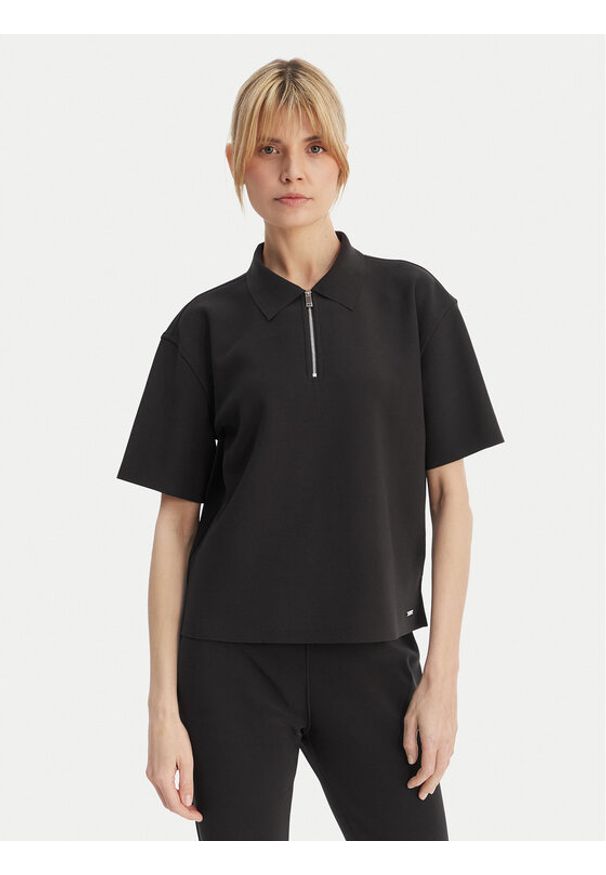 Calvin Klein Polo LV044E241G Czarny Relaxed Fit. Typ kołnierza: polo. Kolor: czarny. Materiał: syntetyk