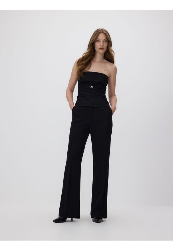 Reserved - Spodnie flare z kantem - czarny. Kolor: czarny. Materiał: tkanina, wiskoza