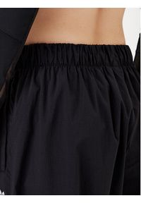 Adidas - adidas Spodnie dresowe Essentials Ripstop JD0785 Czarny Loose Fit. Kolor: czarny. Materiał: syntetyk #2