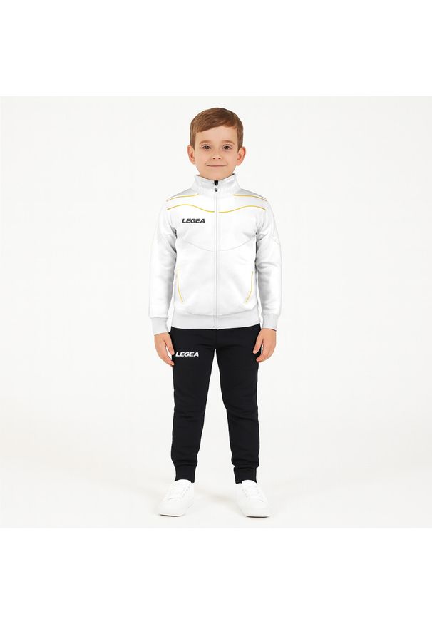 LEGEA - Komplet dresowy dla chłopca TEXAS JUNIOR JR. Okazja: na uczelnię. Kolor: żółty, wielokolorowy, biały. Materiał: dresówka. Styl: sportowy