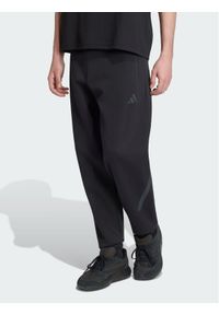 Adidas - adidas Spodnie dresowe Z.N.E. KF3808 Czarny Regular Fit. Kolor: czarny. Materiał: syntetyk #1