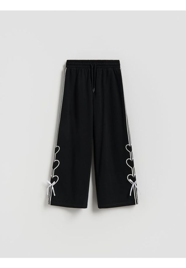Reserved - Spodnie dresowe z kokardkami - czarny. Kolor: czarny. Materiał: dresówka