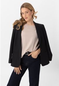 Volcano - Koszulka Comfort Fit T-AVI. Materiał: skóra, materiał, bawełna. Długość: krótkie. Wzór: napisy. Styl: klasyczny