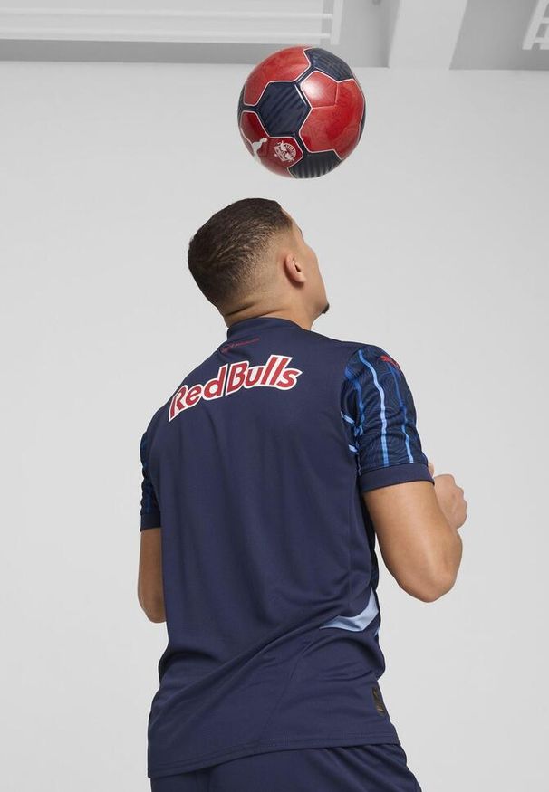 Puma - rb salzburg koszulka outdoor 2024/25. Kolor: czerwony, niebieski, wielokolorowy. Sport: outdoor, piłka nożna