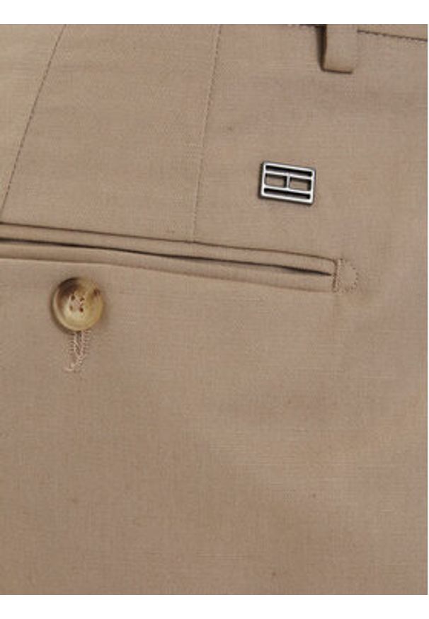 TOMMY HILFIGER - Tommy Hilfiger Szorty materiałowe Smart Casual MW0MW42670 Beżowy jasny Relaxed Fit. Okazja: na co dzień. Kolor: beżowy. Materiał: bawełna. Styl: casual