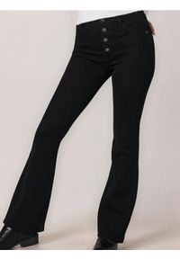 Sinsay - Spodnie jeansowe flare - czarny. Kolor: czarny