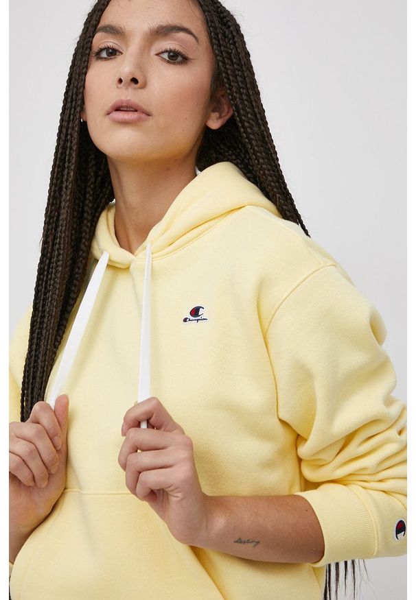 Champion Bluza 114466 damska kolor żółty z kapturem z aplikacją. Typ kołnierza: kaptur. Kolor: żółty. Materiał: bawełna. Wzór: aplikacja