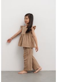 Marsala - MINI spodnie o prostym kroju w kolorze COOKIE BEIGE - PIXIE-80-86 (12-18). Kolor: beżowy. Materiał: bawełna. Wzór: aplikacja. Sezon: lato