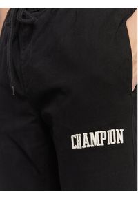Champion Joggery Bookstore Logo 218170 Czarny Custom Fit. Kolor: czarny. Materiał: bawełna