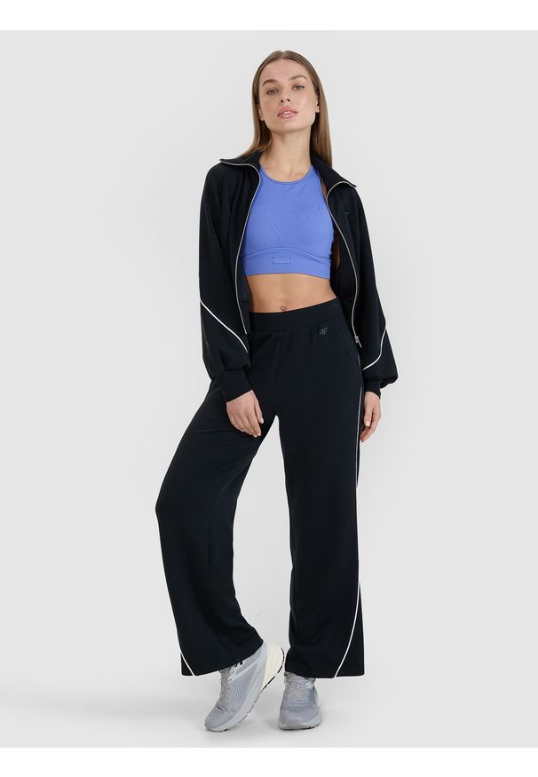 4f - 4F Spodnie dresowe z modalem damskie 4F x Anna Lewandowska - czarne XL. Kolor: czarny. Materiał: dresówka. Wzór: gładki, ze splotem. Sport: fitness