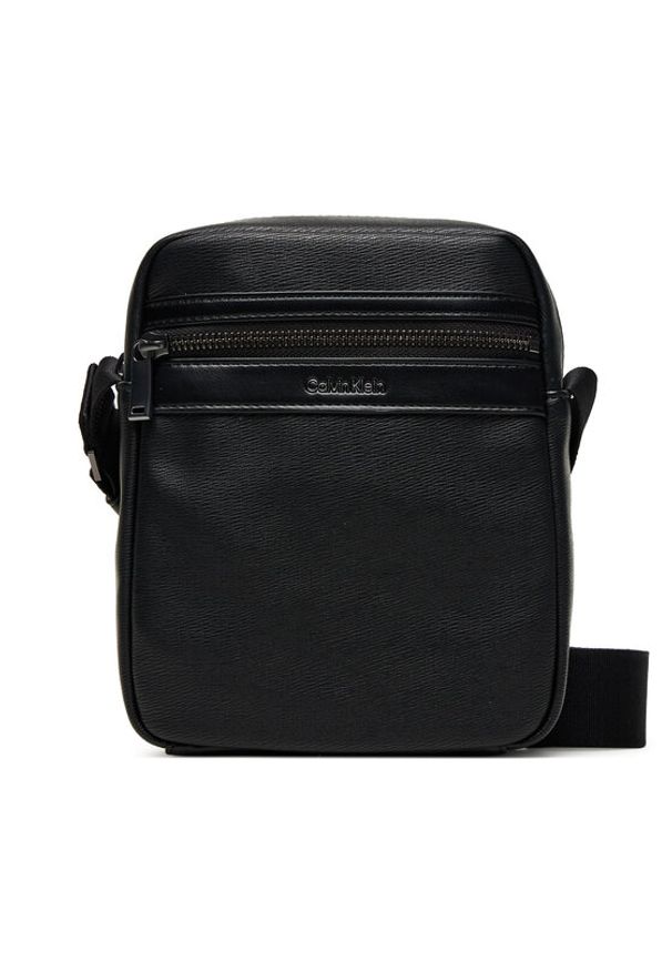 Calvin Klein Saszetka Zip Reporter LV04D3264G Czarny. Kolor: czarny. Materiał: skóra