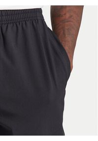 Under Armour Spodnie dresowe Unstoppable 6003861 Czarny Loose Fit. Kolor: czarny. Materiał: syntetyk #4
