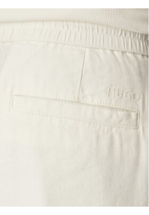 Hugo - HUGO Spodnie materiałowe Cino 262FW 50562791 Kremowy Straight Fit. Kolor: kremowy. Materiał: lyocell
