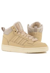 Buty damskie z ociepleniem Adidas RAPID COURT MID J WINTERIZ. Kolor: beżowy. Sport: turystyka piesza