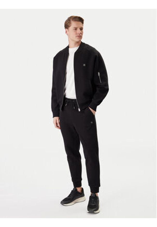 BOSS Spodnie dresowe 50555853 Czarny Regular Fit. Kolor: czarny. Materiał: bawełna
