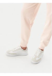 Calvin Klein Jeans Spodnie dresowe Monologo J20J225354 Różowy Slim Fit. Kolor: różowy. Materiał: bawełna #2