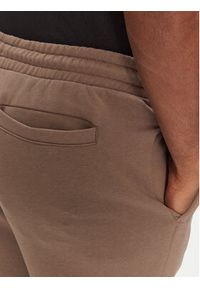 Puma Spodnie dresowe Ess 629651 Brązowy Relaxed Fit. Kolor: brązowy. Materiał: bawełna #5