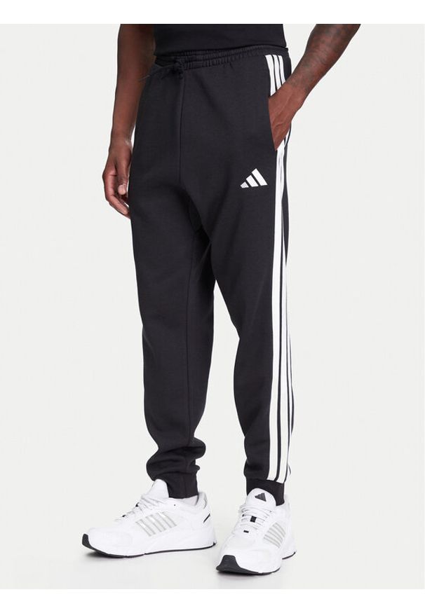 Adidas - adidas Spodnie dresowe Essentials 3-Stripes JD1861 Czarny Regular Fit. Kolor: czarny. Materiał: bawełna