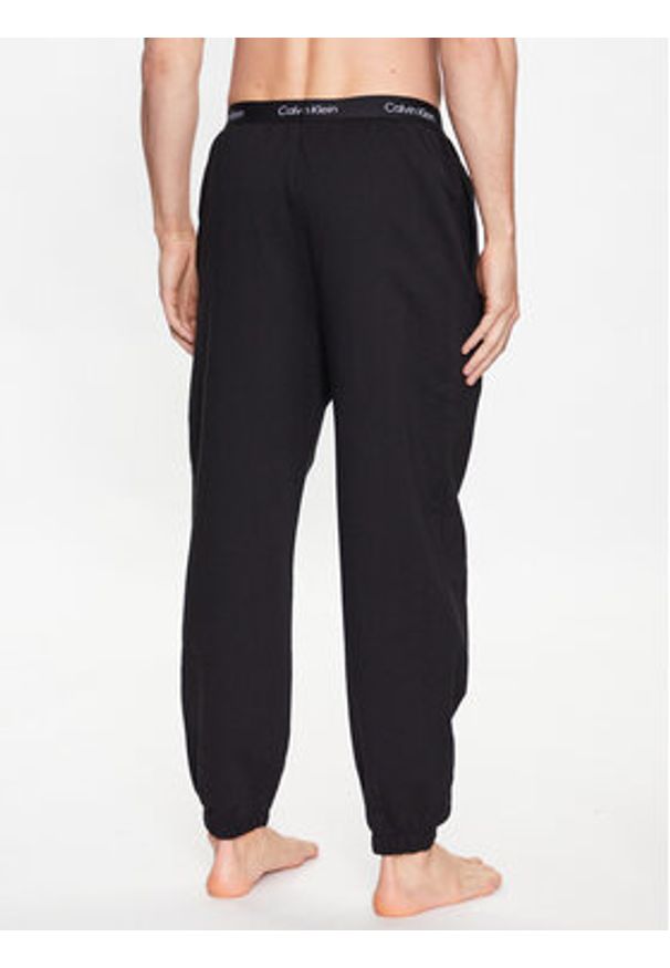 Calvin Klein Underwear Spodnie piżamowe 000NM2393E Czarny Regular Fit. Kolor: czarny. Materiał: bawełna