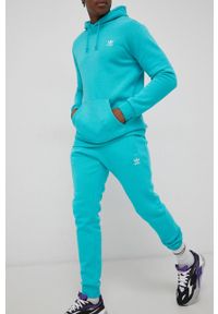 adidas Originals Spodnie męskie kolor turkusowy gładkie. Kolor: turkusowy. Materiał: materiał, bawełna. Wzór: gładki