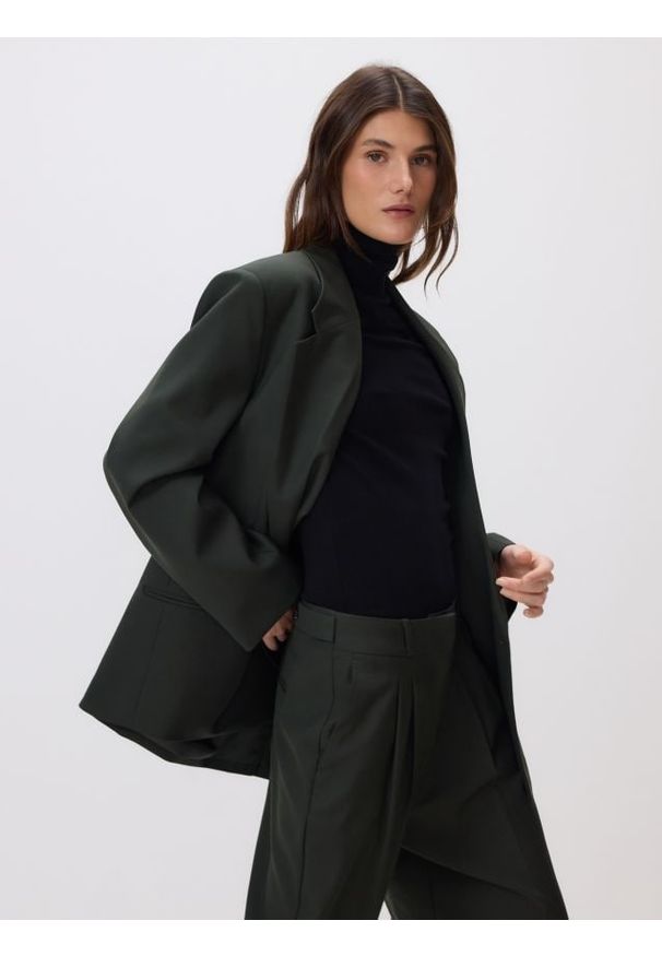 Reserved - Marynarka z wełną - zielony. Kolor: zielony. Materiał: wełna