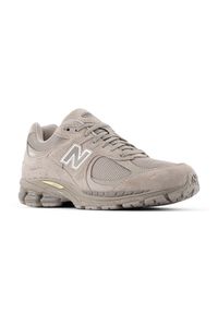 Buty unisex New Balance U2002RP – beżowe. Kolor: beżowy. Materiał: zamsz, guma. Szerokość cholewki: normalna #5
